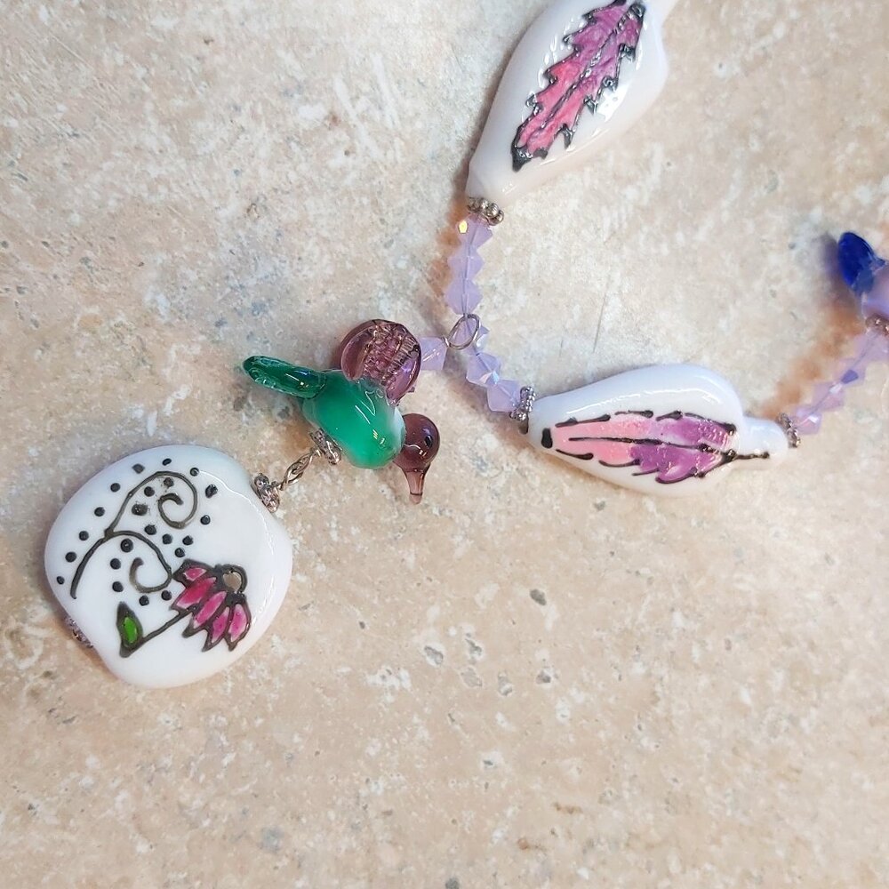 OOK bird and feather lampwork glass bead necklace